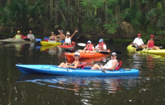 Group of people in kayaks